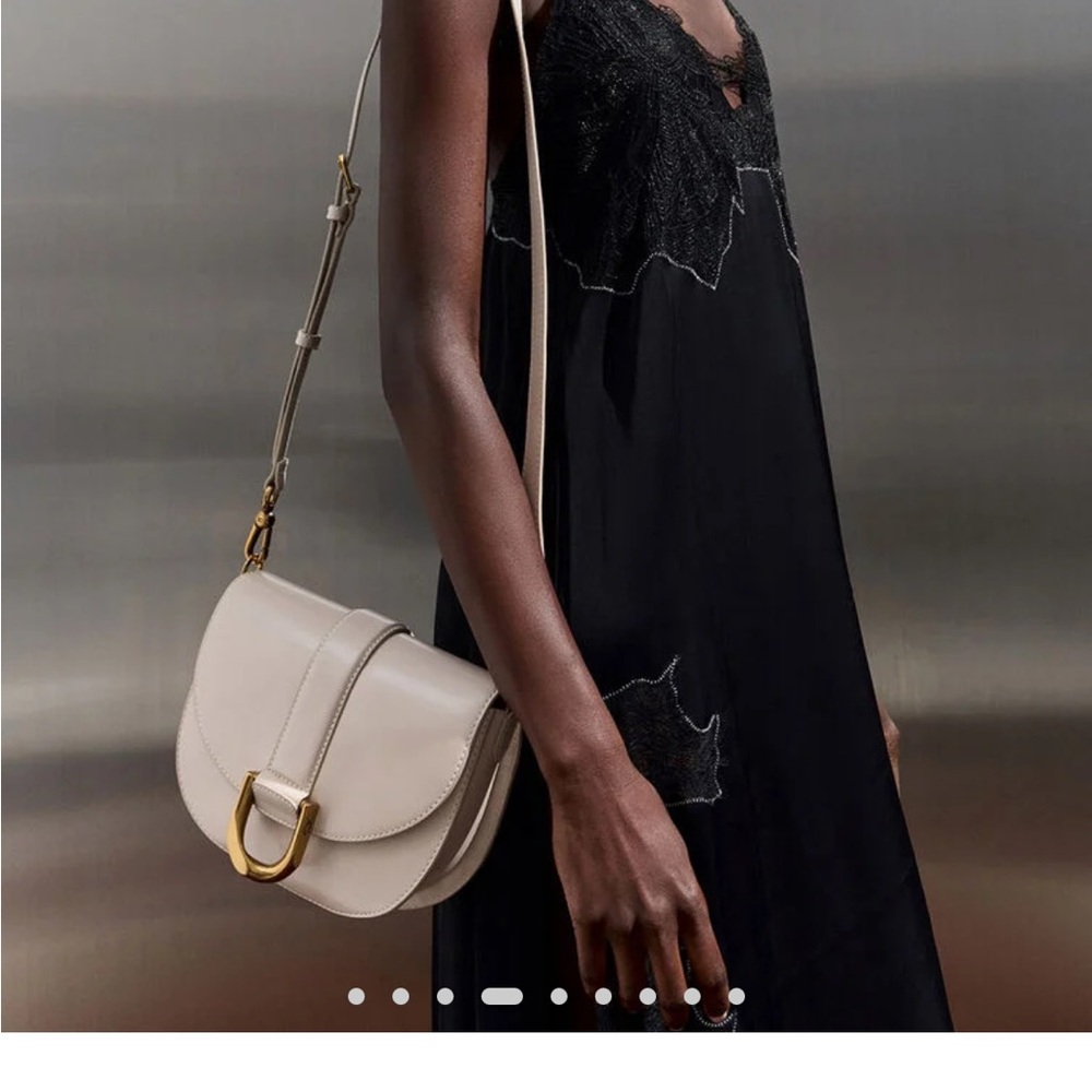 Charles & Keith Crossbody Bag in color oat.